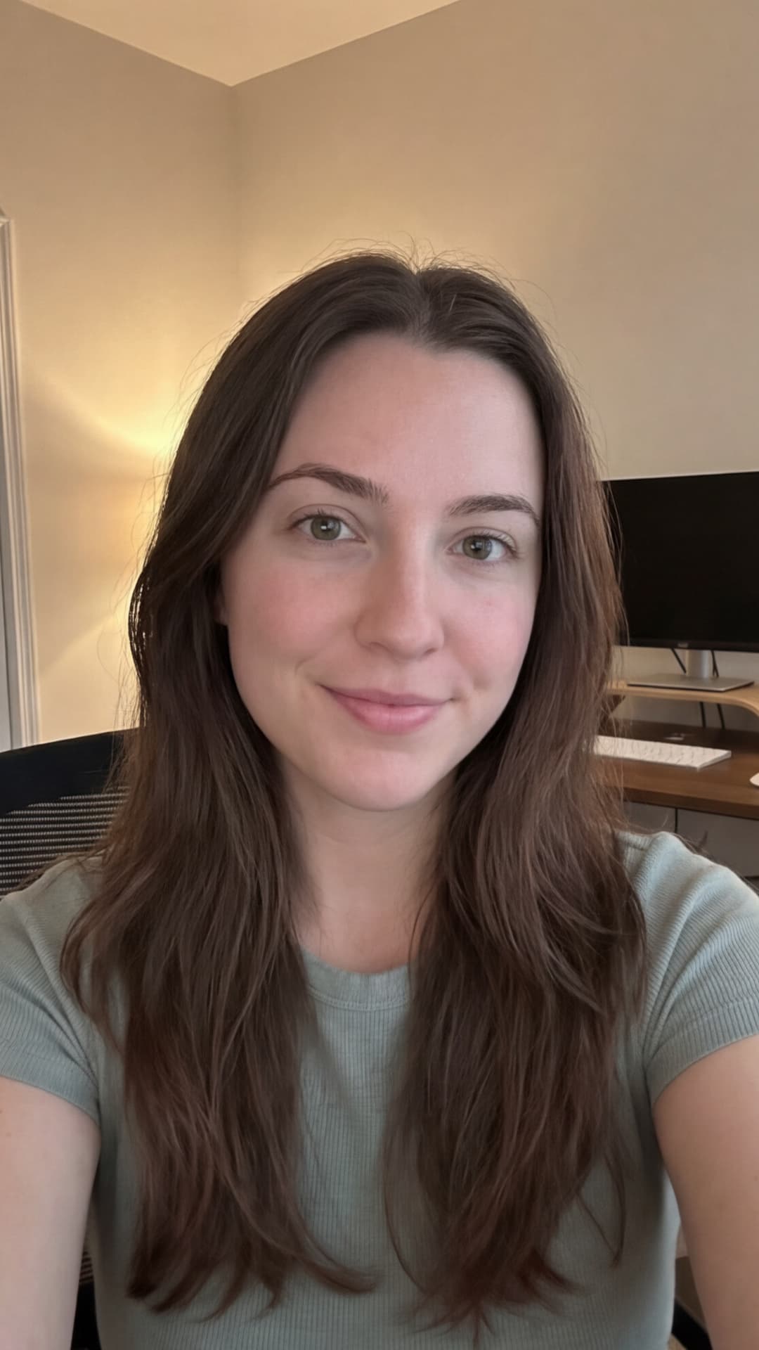 AI-generated actor: a woman in a home office